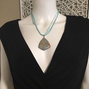 (Video) Uniquely shaped Jasper agate pendant blue with earth tones